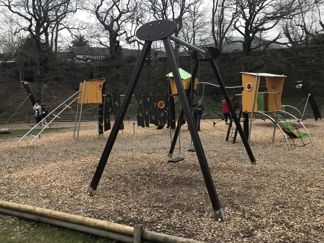 Timber play towers and swings in the Fitz Park playground