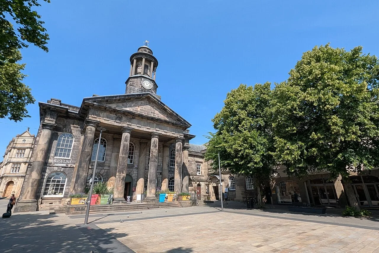 Columned front and clock cupola of Lancaster City Museum beside Market Square