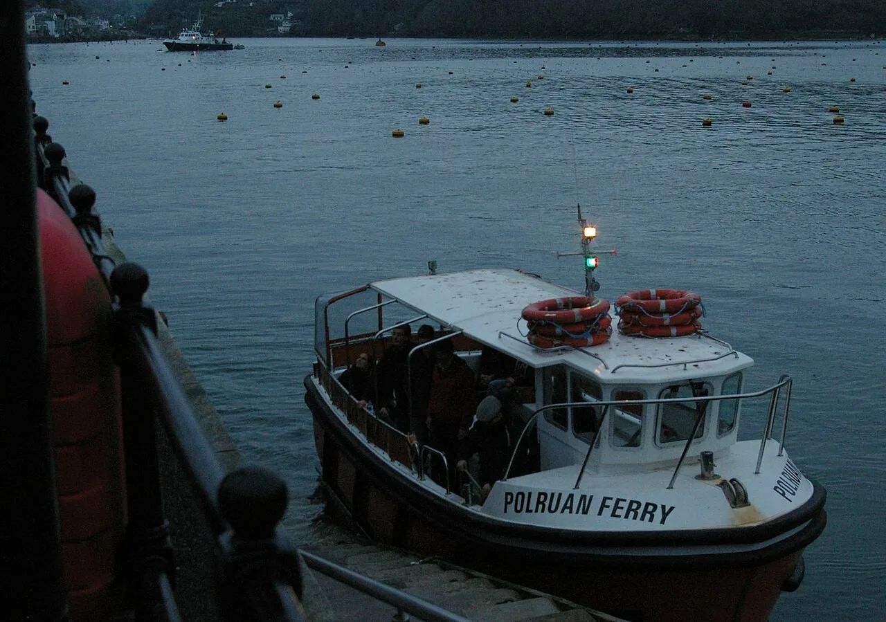 The passenger ferry arriving at Polruan quay from Fowey
