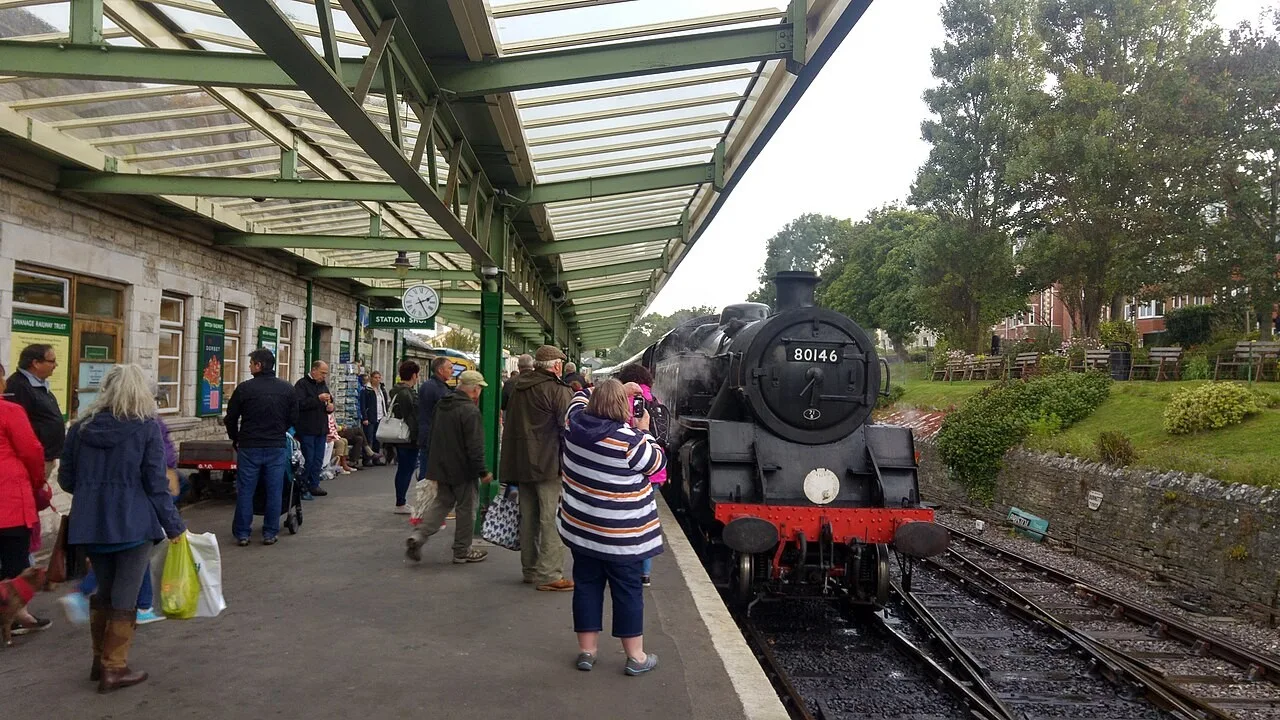 A heritage train arriving at Swanage station