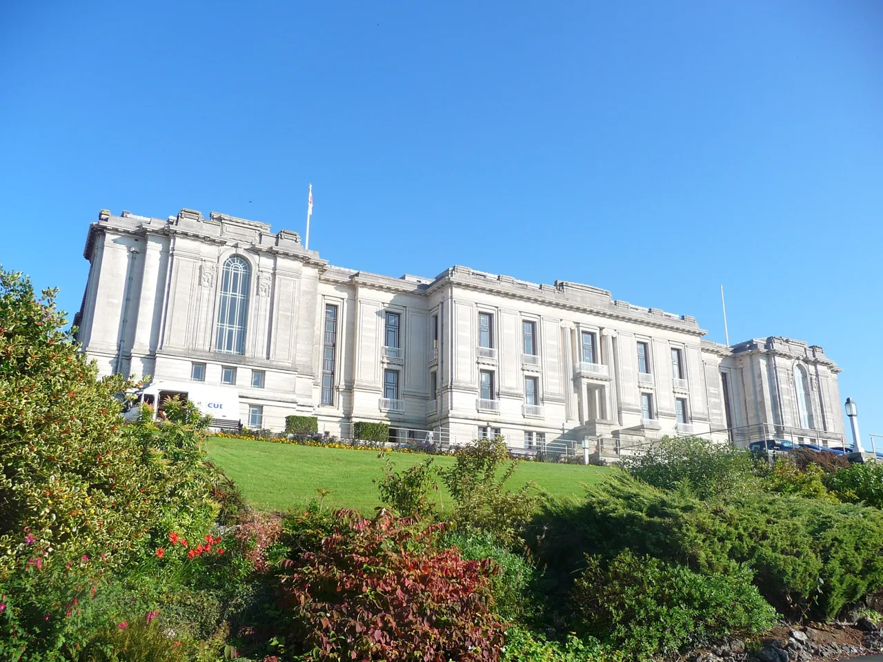 National Library of Wales facade above its landscaped grounds