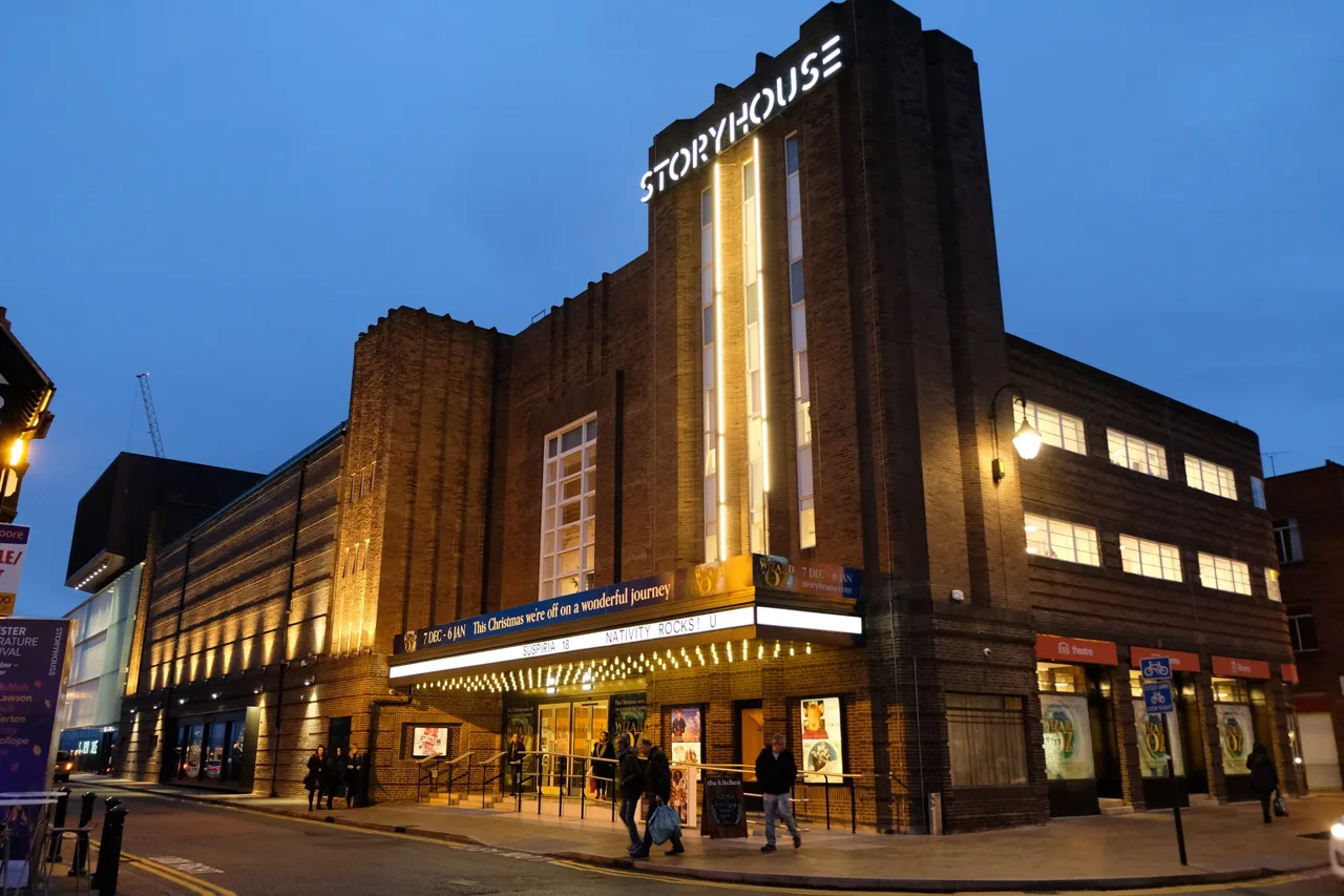 Storyhouse’s illuminated Art Deco frontage at dusk in Chester