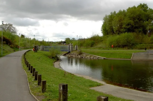 Footbridge and water in Parc Taf Bargoed near Treharris