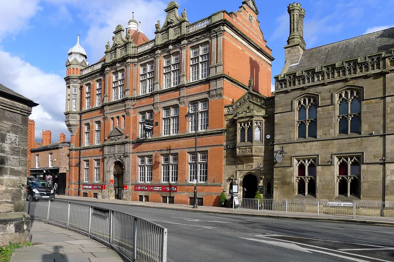 The brick and stone frontage of Grosvenor Museum on Grosvenor Street