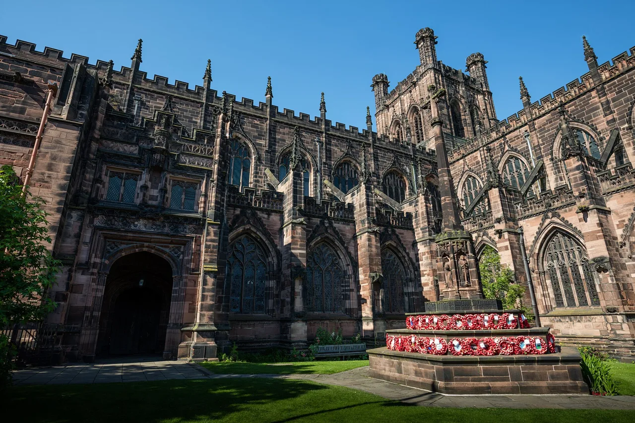 Chester Cathedral’s sandstone exterior and memorial wreaths