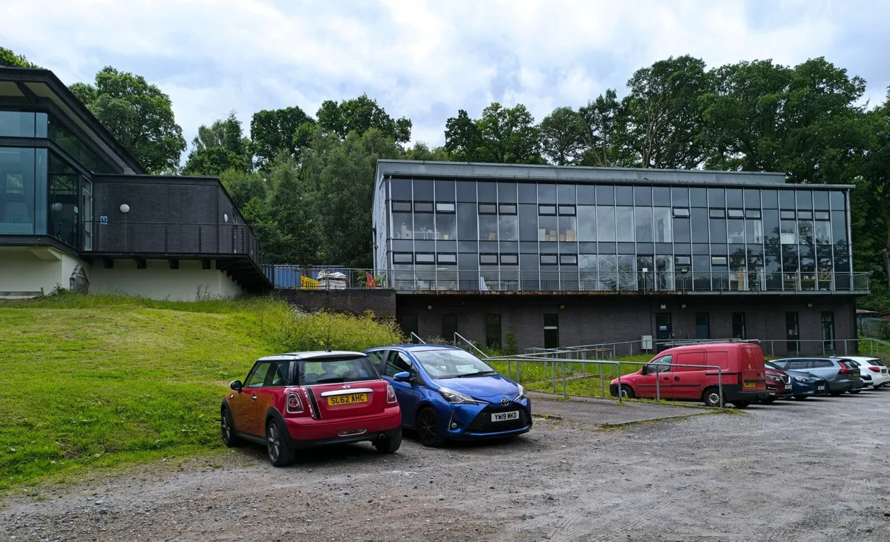 Pitlochry Festival Theatre exterior beside its sloping grounds