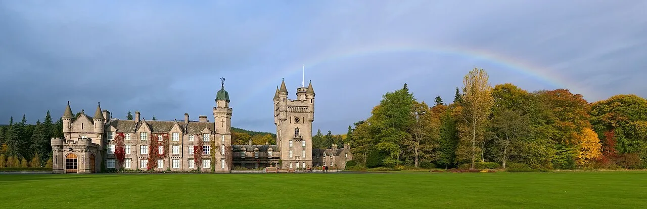 Balmoral Castle and park with a rainbow