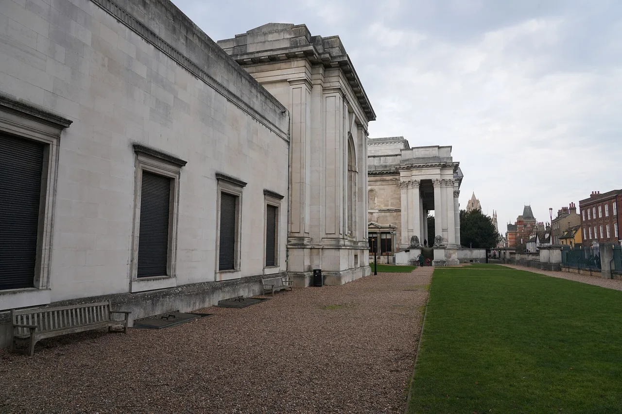 Stone exterior and columned portico of the Fitzwilliam Museum on Trumpington Street
