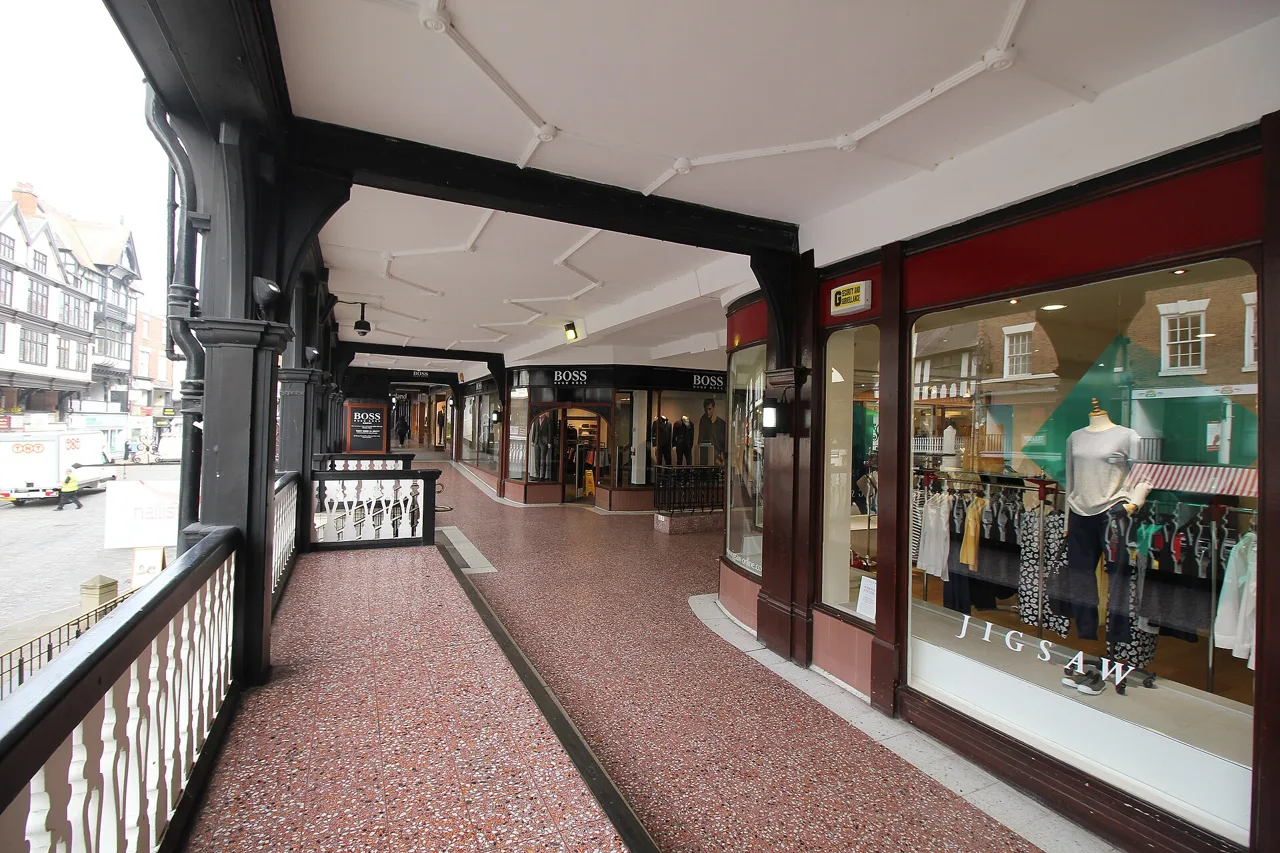 A covered upper-level gallery overlooking Bridge Street in Chester