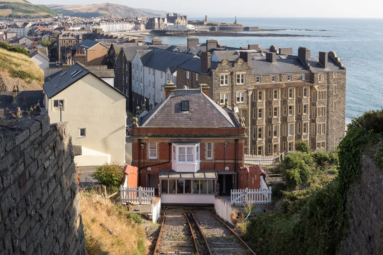Cliff Railway tracks descend towards the lower station and Aberystwyth bay