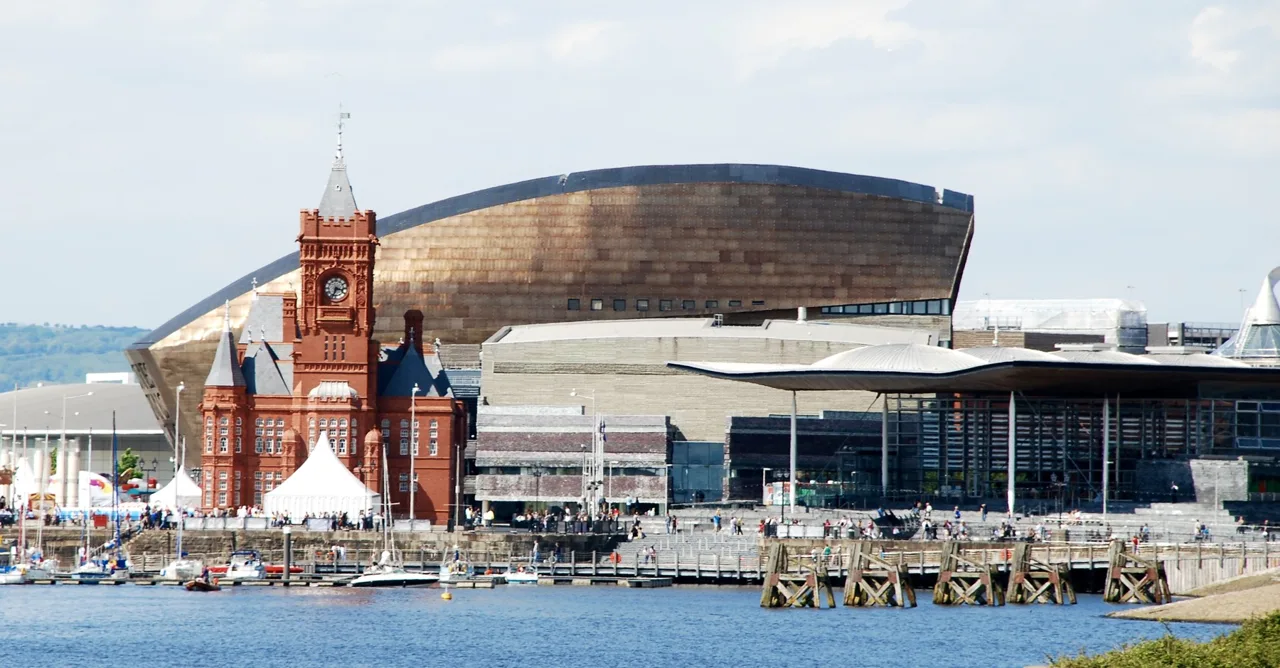 Cardiff Bay waterfront with the red Pierhead, Senedd and Wales Millennium Centre