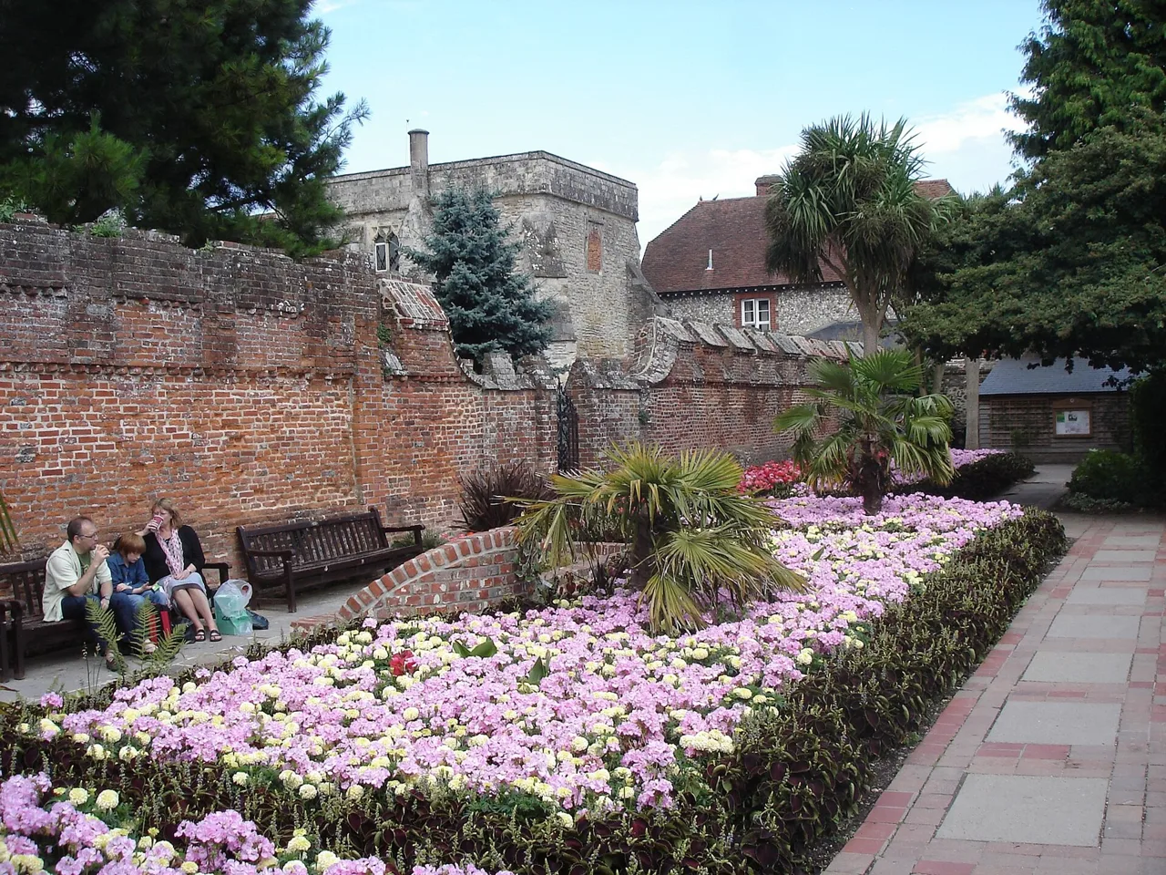 Flower beds, seating and historic walls in Bishop’s Palace Gardens