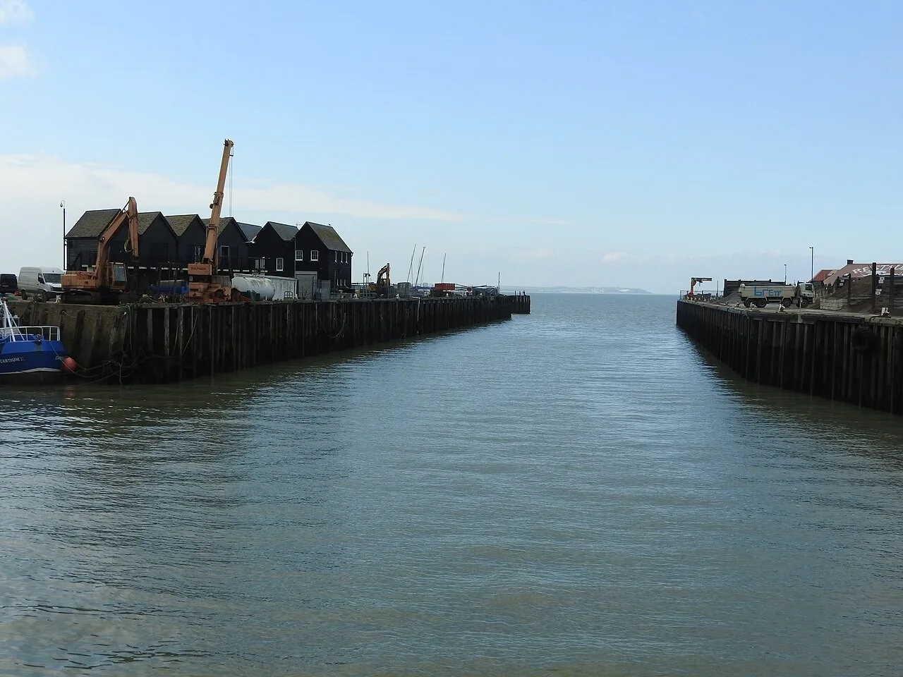 Boats and waterfront buildings at Whitstable Harbour