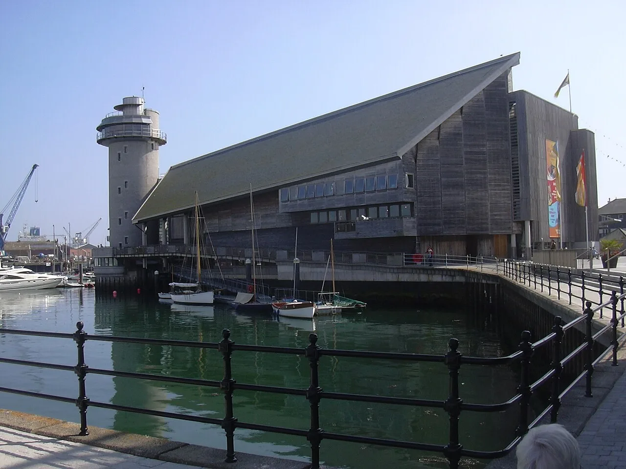 Timber-clad National Maritime Museum Cornwall and its tower beside the harbour, photographed in 2007