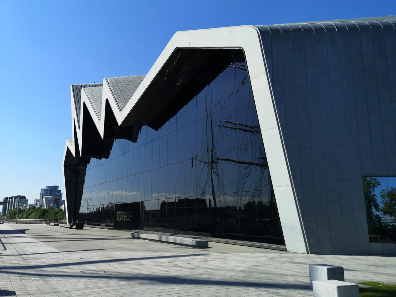 The angular glazed entrance and zigzag roof of Riverside Museum