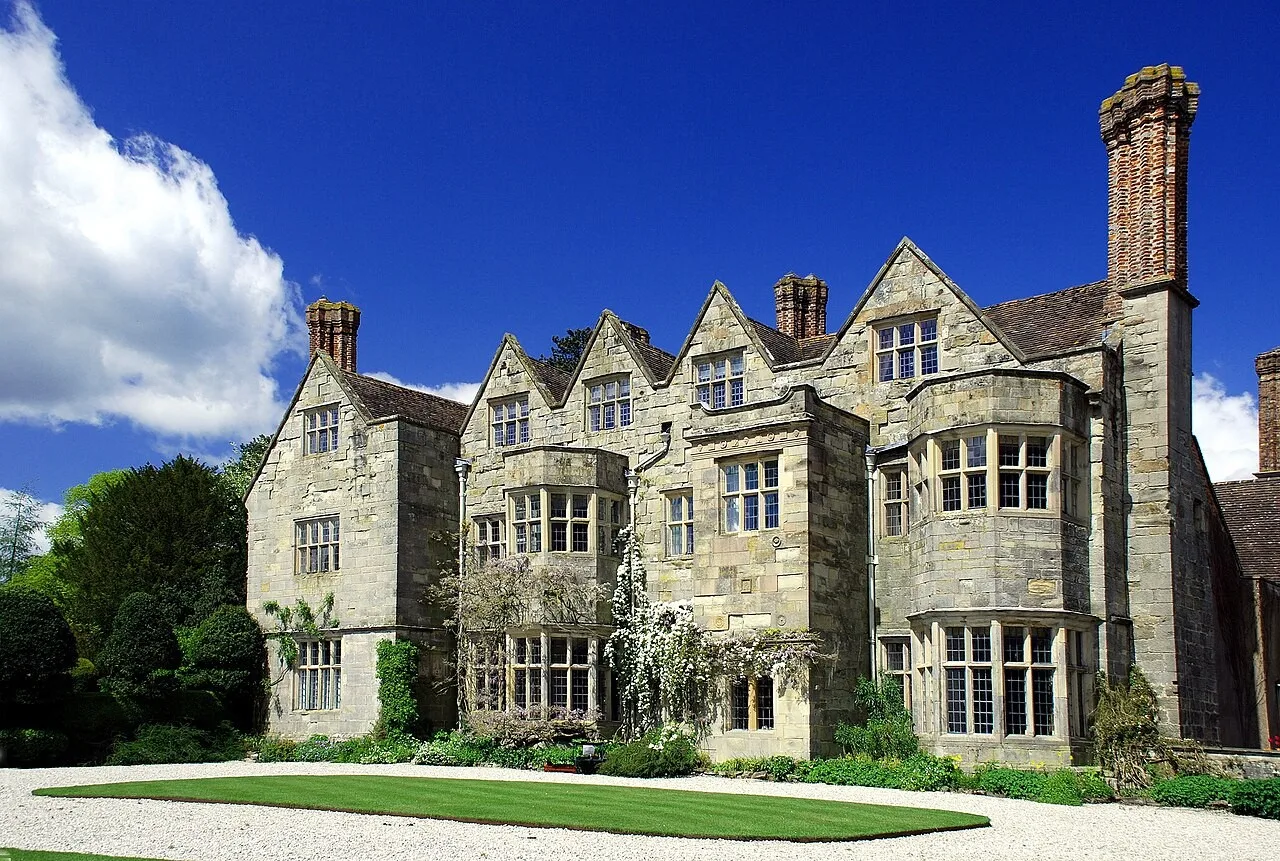 Stone facade and lawn at Benthall Hall