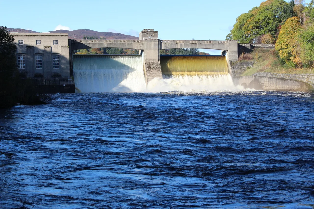 Pitlochry Dam spilling into the River Tummel