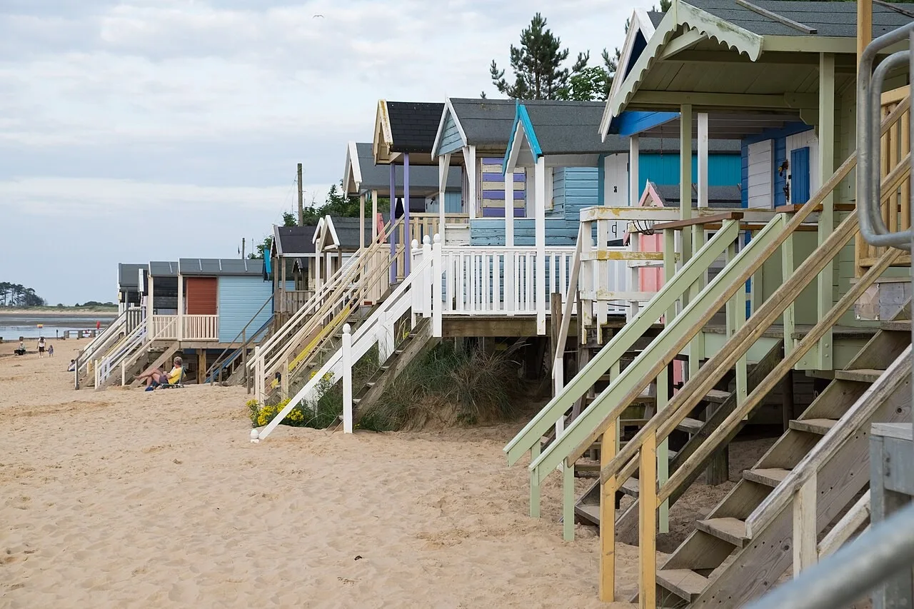 Colourful beach huts above the sand at Wells-next-the-Sea