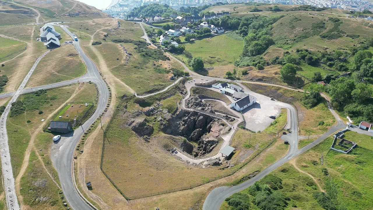 The open excavation and visitor buildings at Great Orme Mines