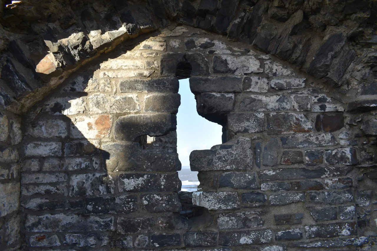 A stone window opening and surviving masonry at Aberystwyth Castle