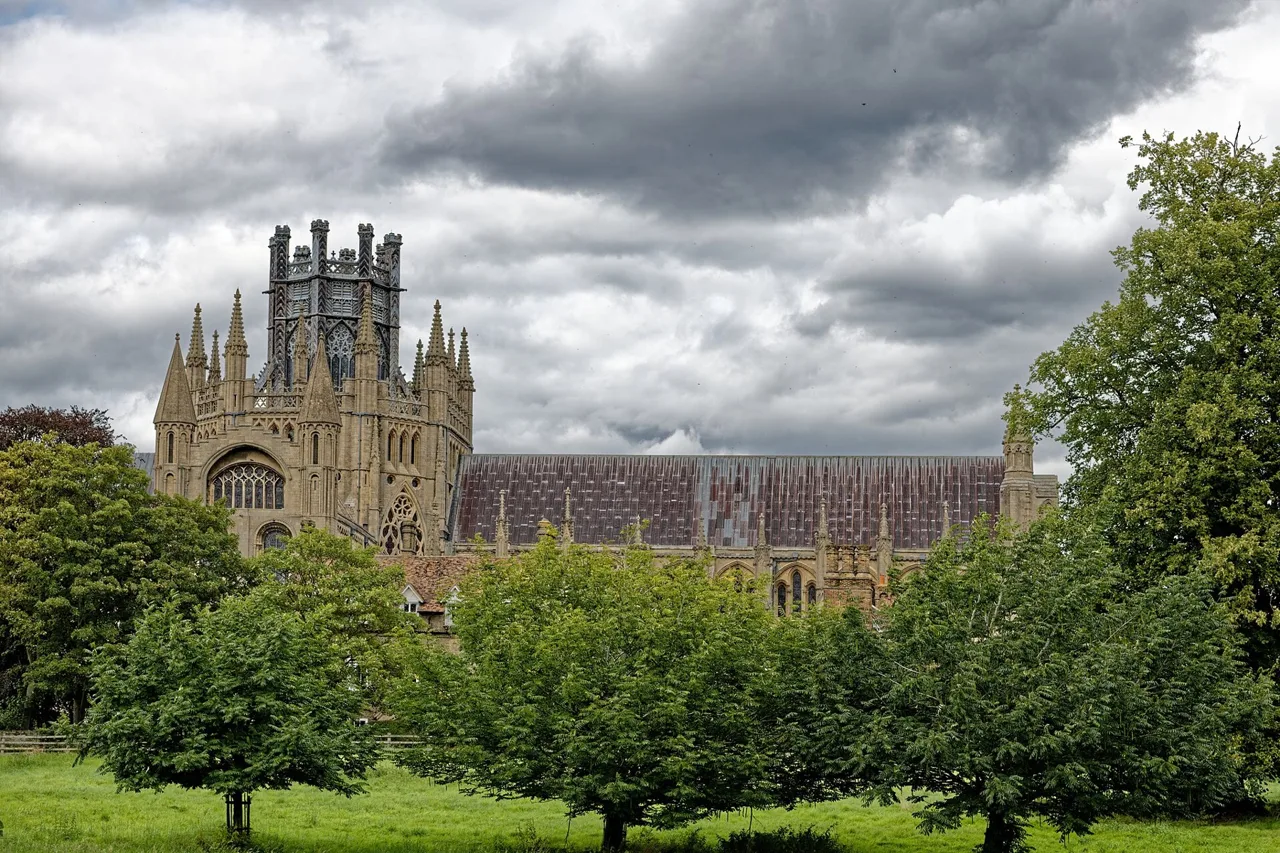 Ely Cathedral viewed from the south, the building housing the Stained Glass Museum