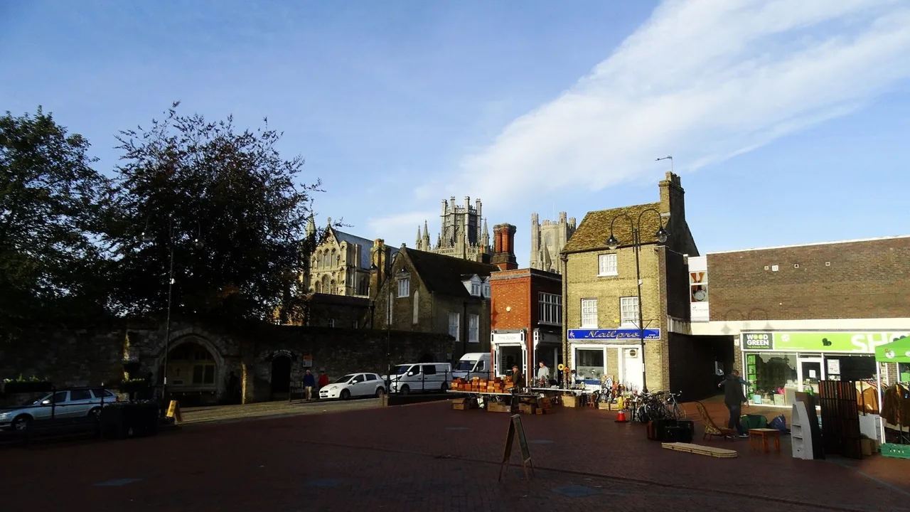 Ely Market Place with surrounding buildings and the cathedral beyond
