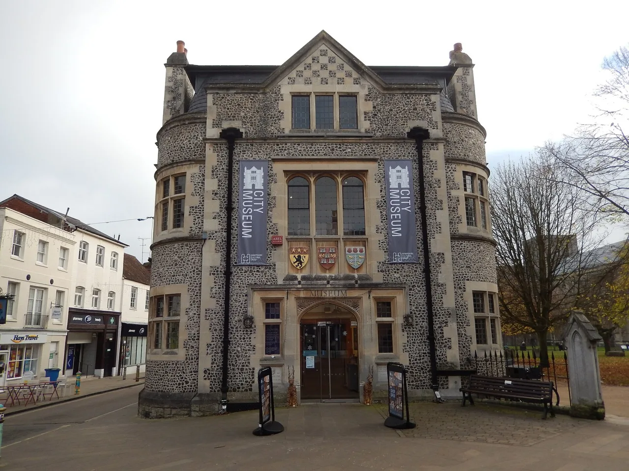 The stone frontage and entrance of Winchester City Museum on The Square