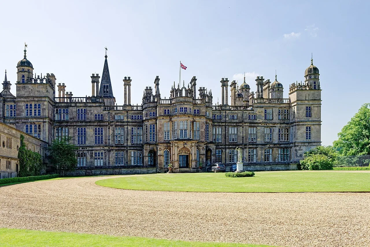 The stone frontage and towers of Burghley House near Stamford