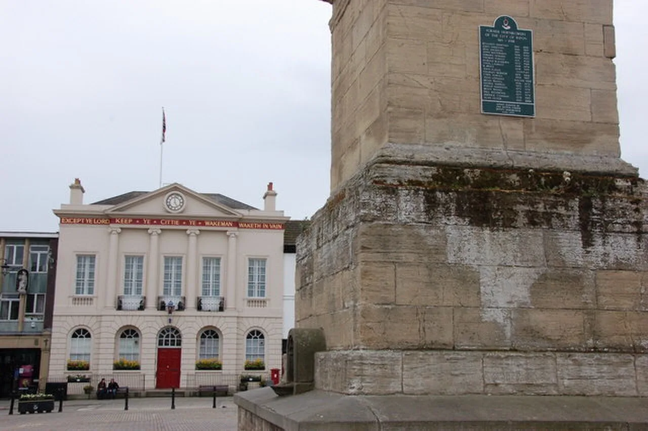 Base of the Market Place obelisk and Ripon Town Hall, location of the evening Hornblower ceremony