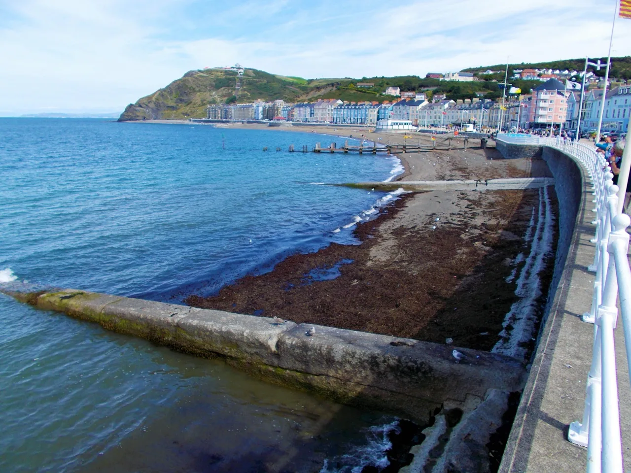 Aberystwyth promenade curving around North Beach towards Constitution Hill