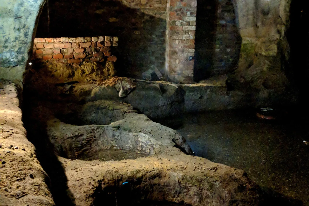 Sandstone chambers and brickwork inside the City of Caves at Drury Hill