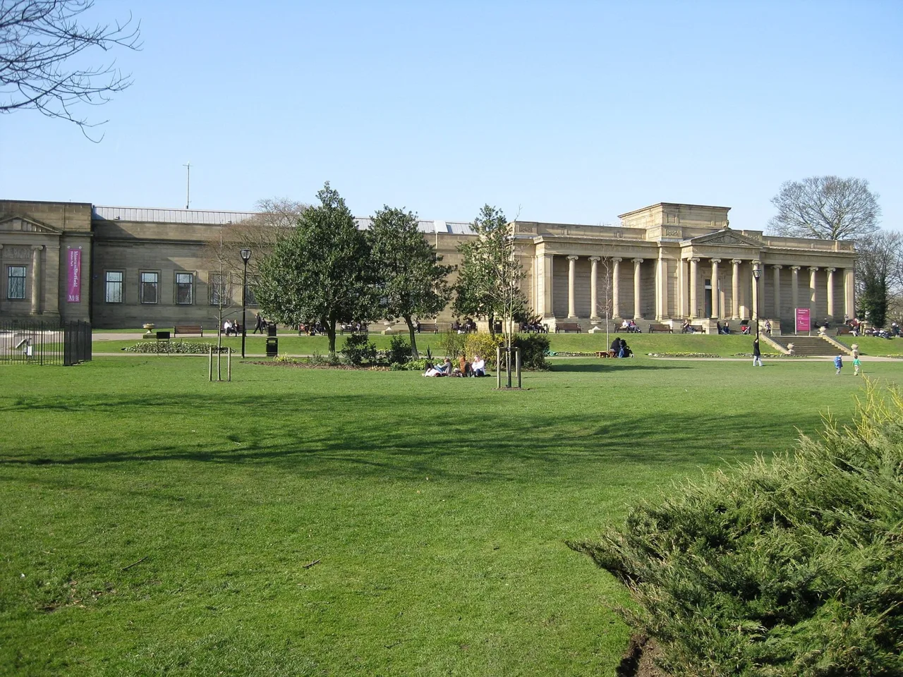 Colonnaded Weston Park Museum behind the park lawn