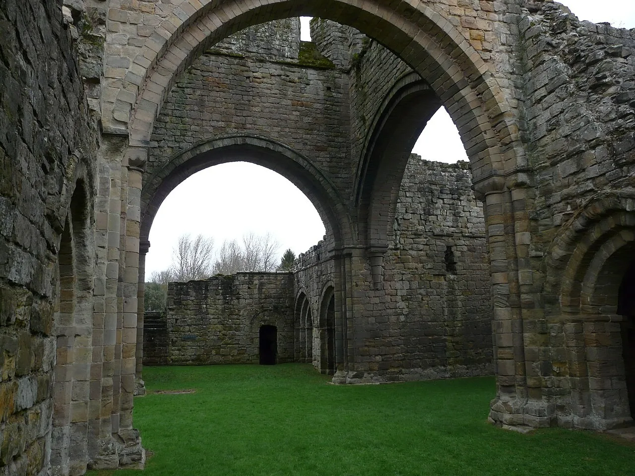 Surviving arches and grassed church ruins at Buildwas Abbey