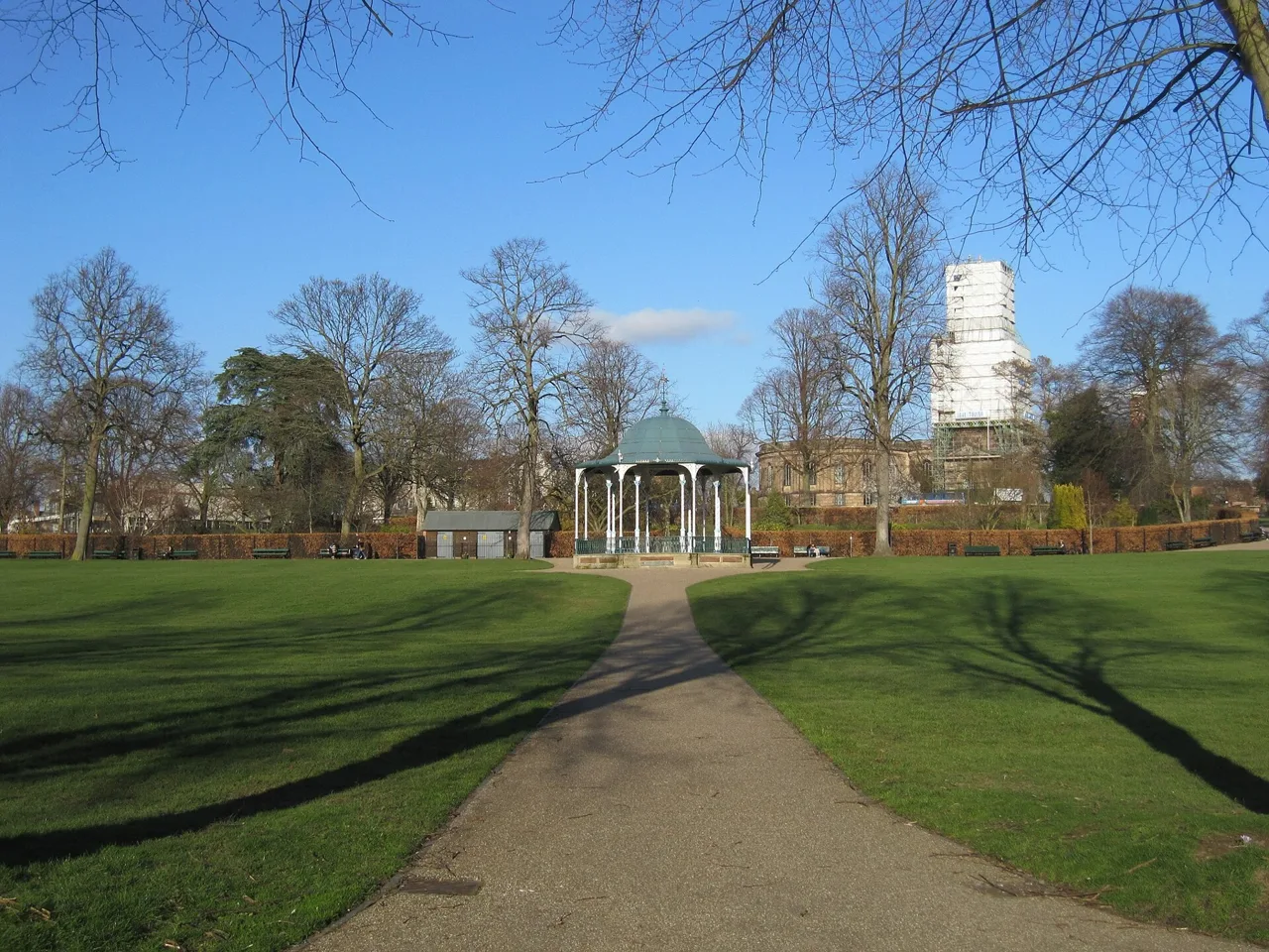 Path towards the bandstand in the Quarry, with St Chad’s Church beyond