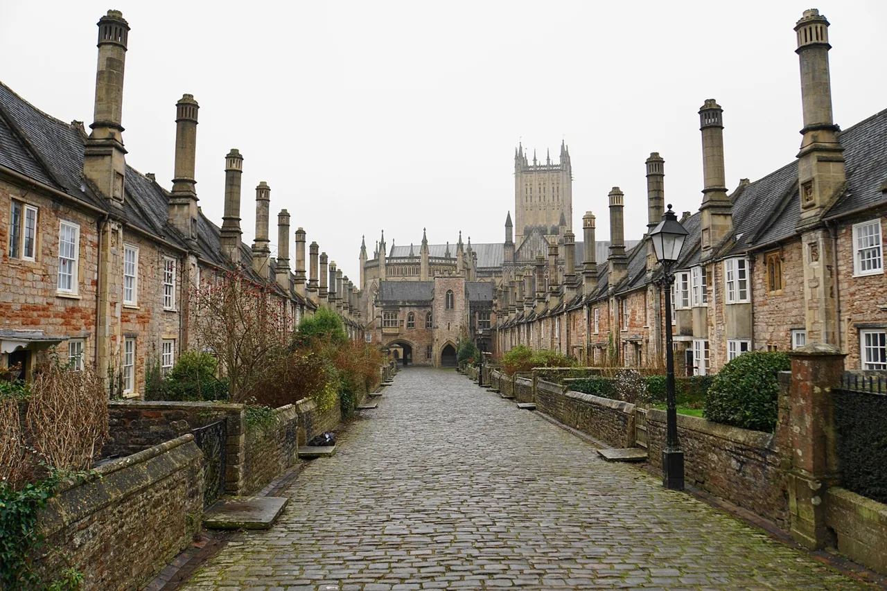 The medieval houses and chimneys of Vicars’ Close towards Wells Cathedral