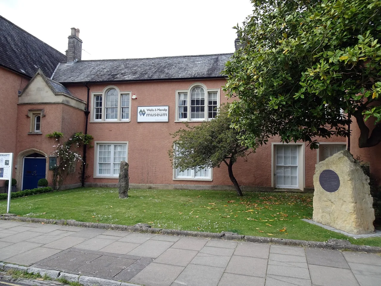 The signed exterior of Wells & Mendip Museum on Cathedral Green