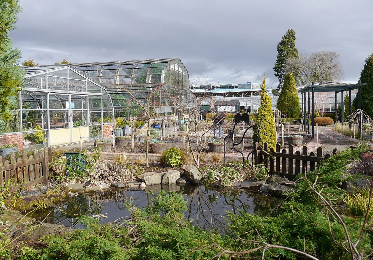 Outdoor planting and glasshouses at Inverness Botanic Gardens