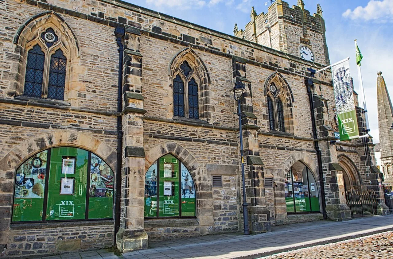Stone facade and museum windows of the former Trinity Church housing Green Howards Museum