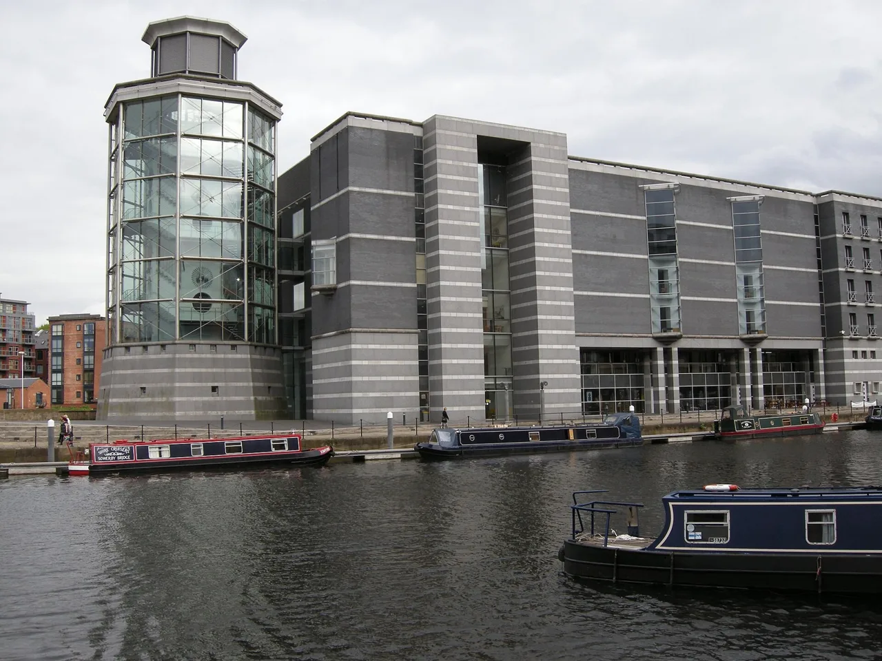 Royal Armouries Museum beside moored boats at Leeds Dock
