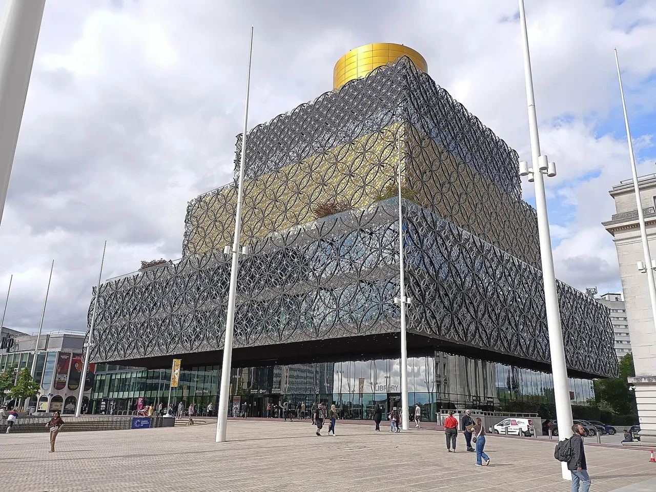 The patterned Library of Birmingham building and gold rooftop drum seen from Centenary Square