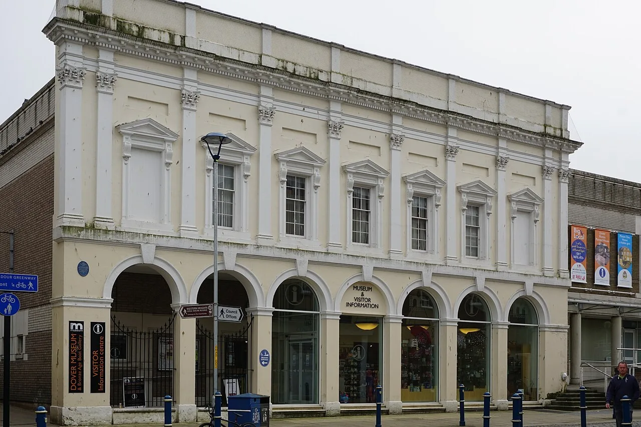 Arched entrance and pale frontage of Dover Museum