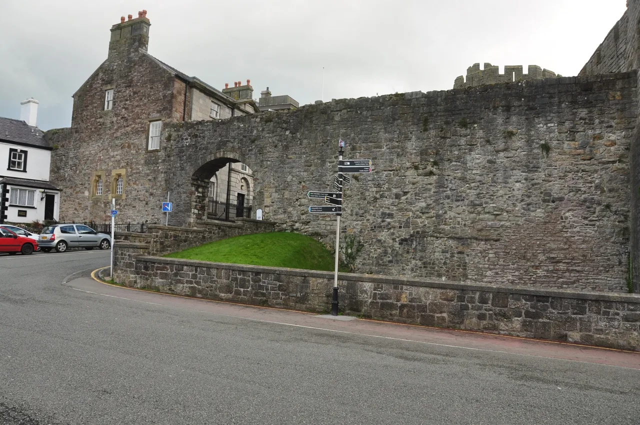 A medieval gateway and stone town wall in Caernarfon