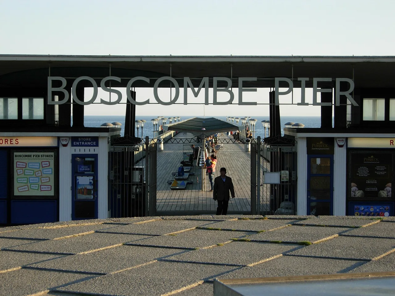 The Boscombe Pier entrance framing the deck and sea beyond