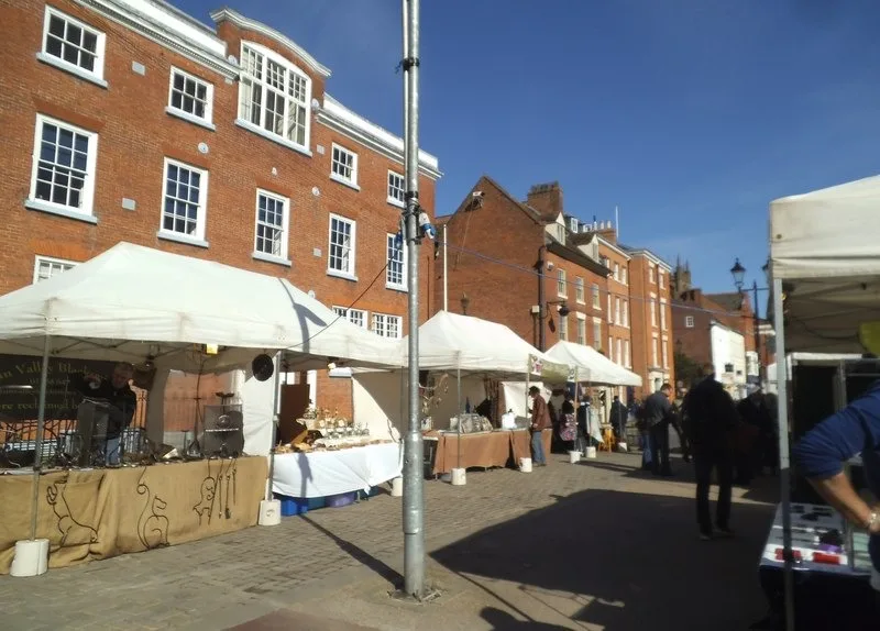 Outdoor market stalls along Ludlow’s historic town-centre street