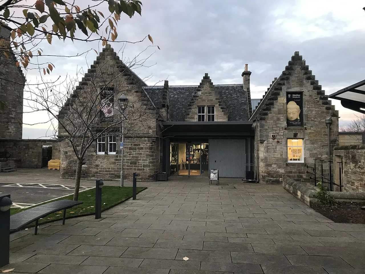 The signed entrance and gabled exterior of Wardlaw Museum