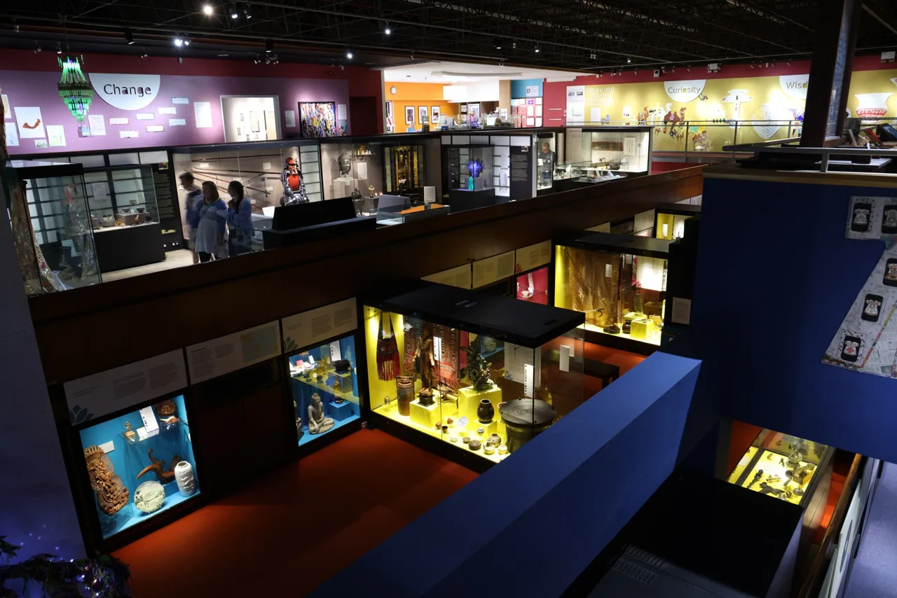 Display cases across two levels inside Durham University’s Oriental Museum