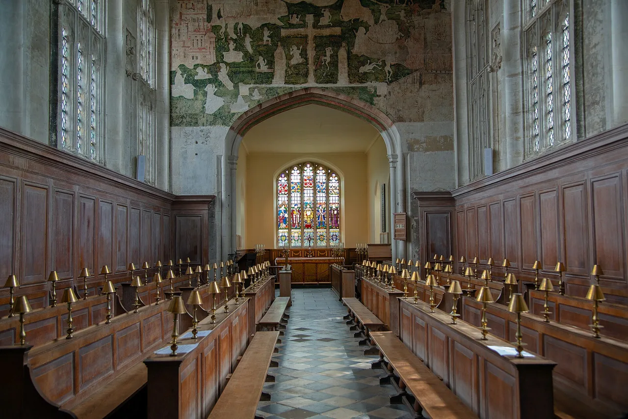 Medieval wall paintings above the chancel arch inside the Guild Chapel